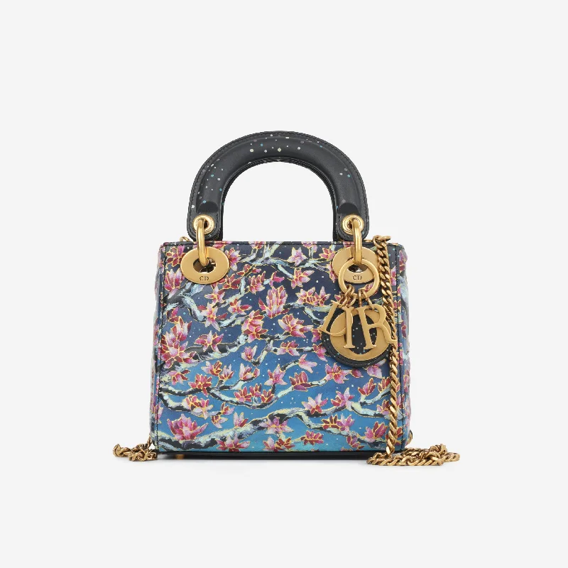 Trendsetting Christian Dior crossbody bags with a colorful strapMini Lady Dior Art