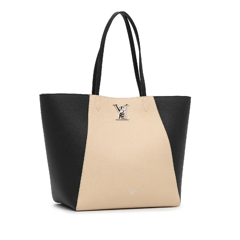 Louis Vuitton bags with a chain - link trim and a leather body for a modern edgeLouis Vuitton LockMe Cabas (Y3DBMm)