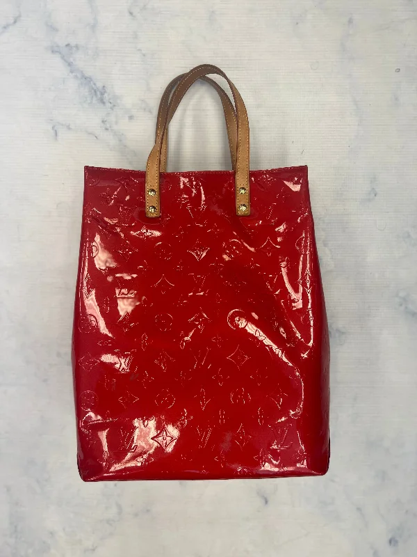 Louis Vuitton bags with a chain - link trim and a leather body for a modern edgeHandbag Luxury Designer By Louis Vuitton  Size: Medium