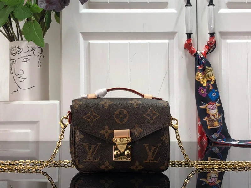 Louis Vuitton bags with a chain - link trim and a leather body for a modern edgeBoldCollect - LOUIS VUITTON BAGS - 1985