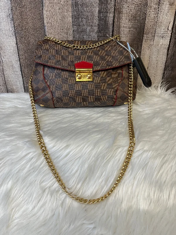 Louis Vuitton bags with a chain - link trim and a leather body for a modern edgeHandbag Luxury Designer By Louis Vuitton  Size: Medium