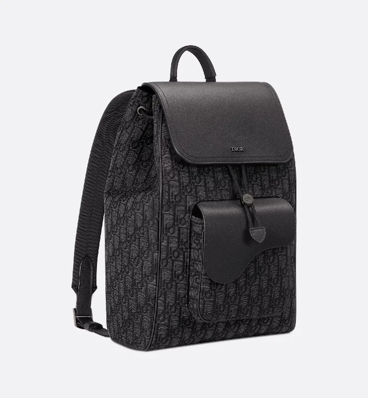 Christian Dior bags with a side - pocket for holding a water bottleSaddle Backpack Black Dior Oblique Jacquard and Grained Calfskin