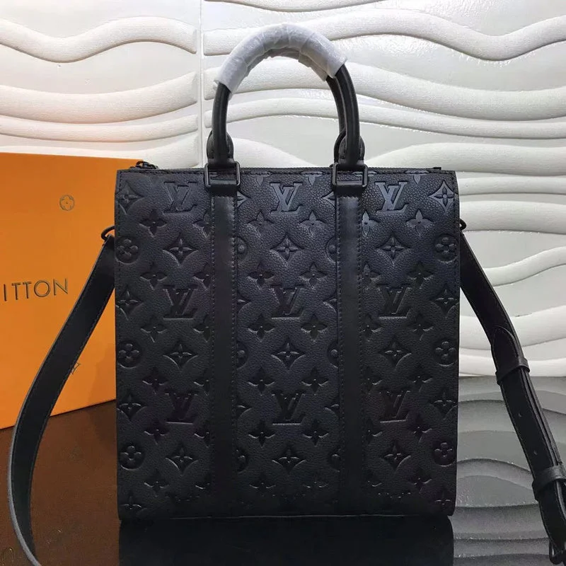 Louis Vuitton bags with a chain - link trim and a leather body for a modern edgeBoldCollect - LOUIS VUITTON BAGS - 2002