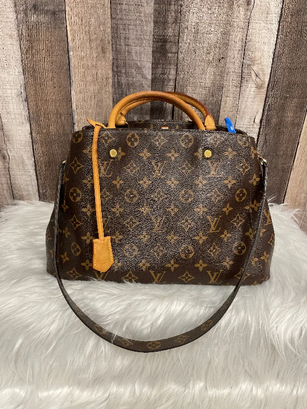 Louis Vuitton bags with a chain - link trim and a leather body for a modern edgeHandbag Luxury Designer By Louis Vuitton  Size: Medium