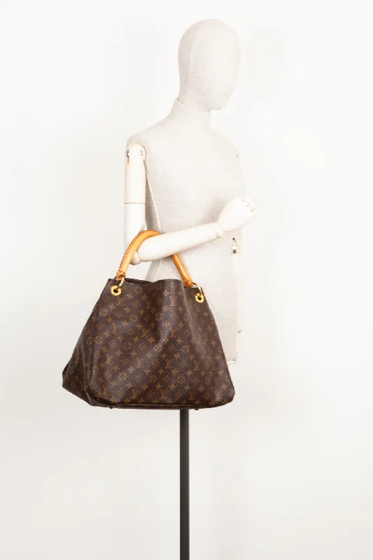 Louis Vuitton bags with a chain - link trim and a leather body for a modern edgeLOUIS VUITTON Artsy MM Bag Monogram Canvas