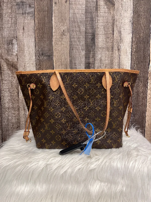 Louis Vuitton bags with a chain - link trim and a leather body for a modern edgeHandbag Luxury Designer By Louis Vuitton  Size: Medium