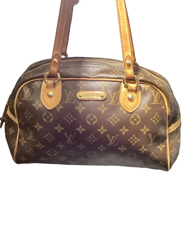 Louis Vuitton bags with a chain - link trim and a leather body for a modern edgeHandbag Designer By Louis Vuitton  Size: Medium