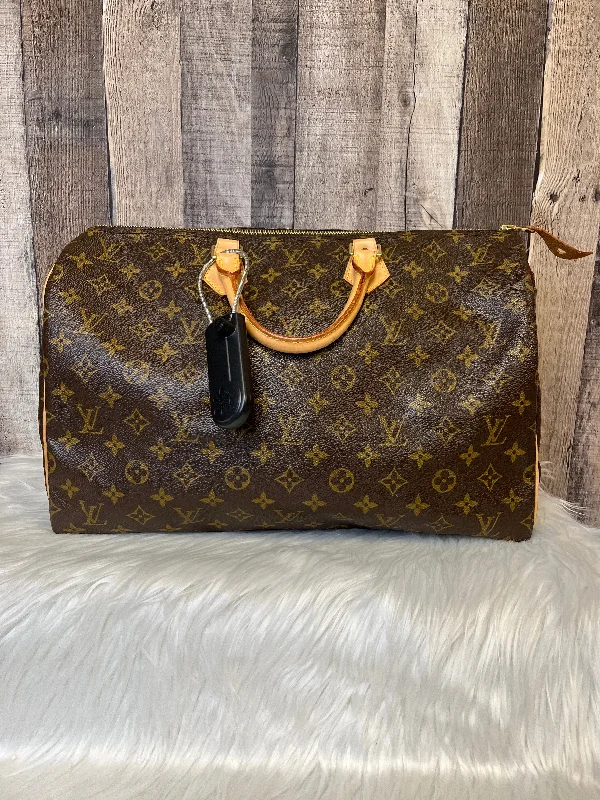 Louis Vuitton bags with a chain - link trim and a leather body for a modern edgeHandbag Luxury Designer By Louis Vuitton  Size: Large