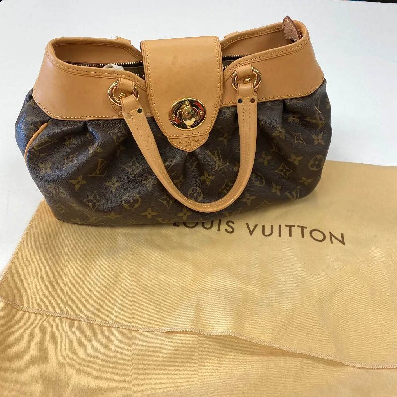 Louis Vuitton bags with a chain - link trim and a leather body for a modern edgeHandbag Luxury Designer By Louis Vuitton  Size: Medium