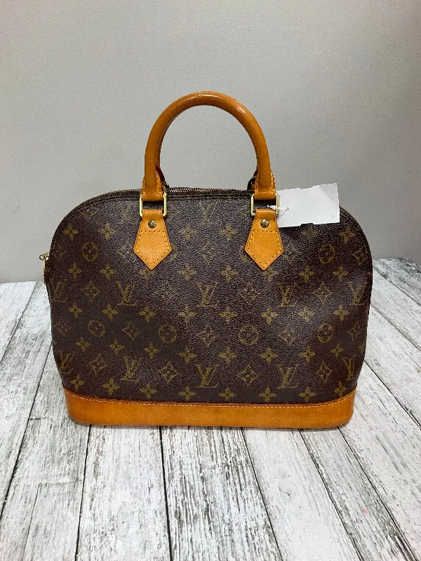 Louis Vuitton bags with a chain - link trim and a leather body for a modern edgeHandbag Designer By Louis Vuitton  Size: Medium