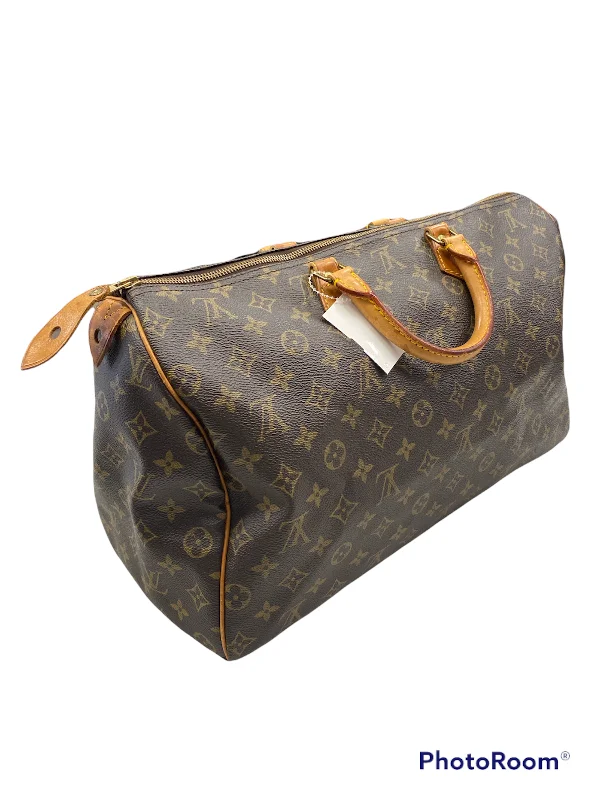 Louis Vuitton bags with a chain - link trim and a leather body for a modern edgeHandbag Designer By Louis Vuitton  Size: Large