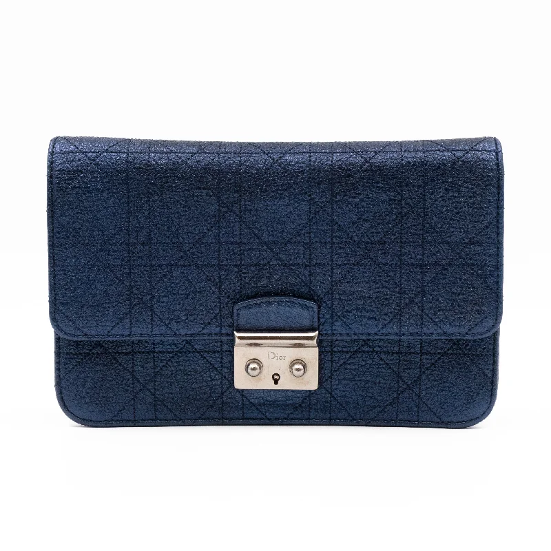 Christian Dior Saddle bags with a distressed leather finishMiss Dior Promenade Clutch Metallic Blue Leather