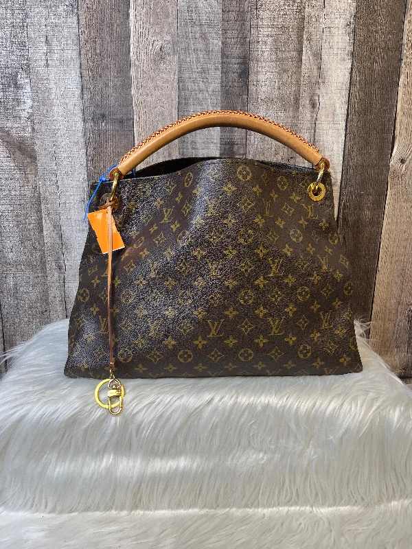 Louis Vuitton bags with a chain - link trim and a leather body for a modern edgeHandbag Luxury Designer By Louis Vuitton  Size: Large