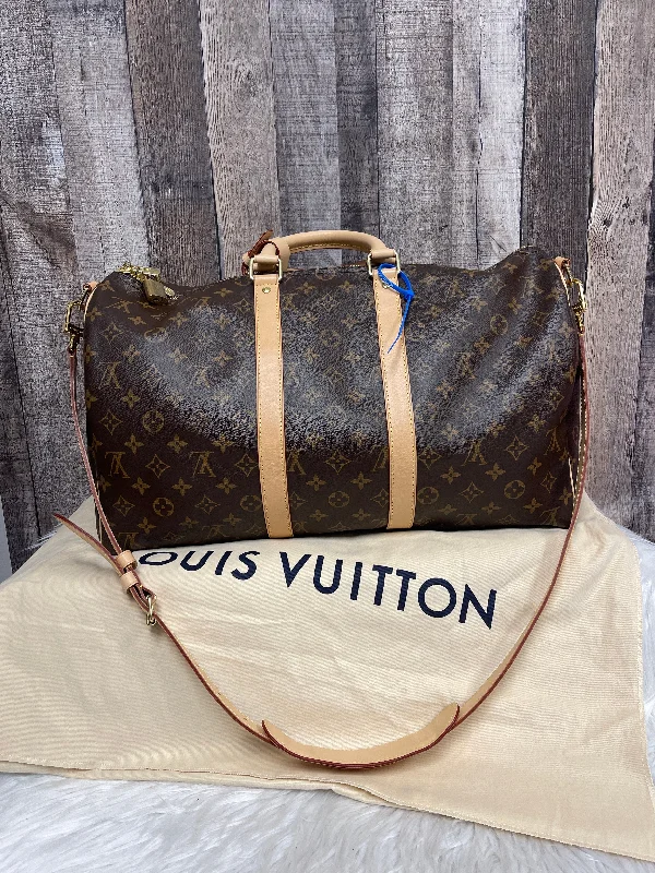 Louis Vuitton bags with a chain - link trim and a leather body for a modern edgeHandbag Luxury Designer By Louis Vuitton  Size: Large