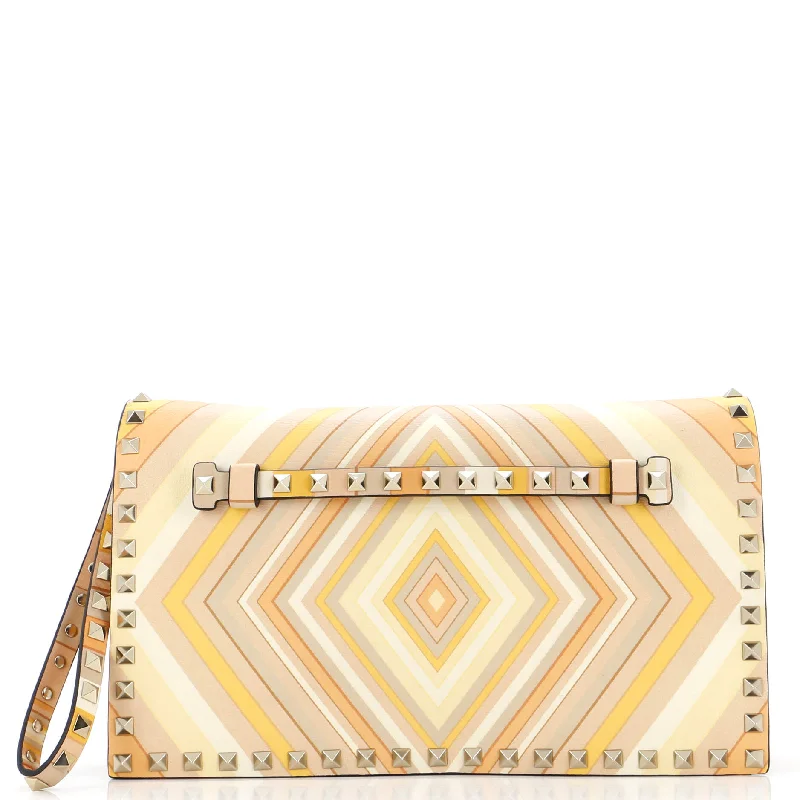 Christian Dior bags with a quilted pattern and gold - toned hardware1975 Rockstud Flap Clutch Striped Leather Medium