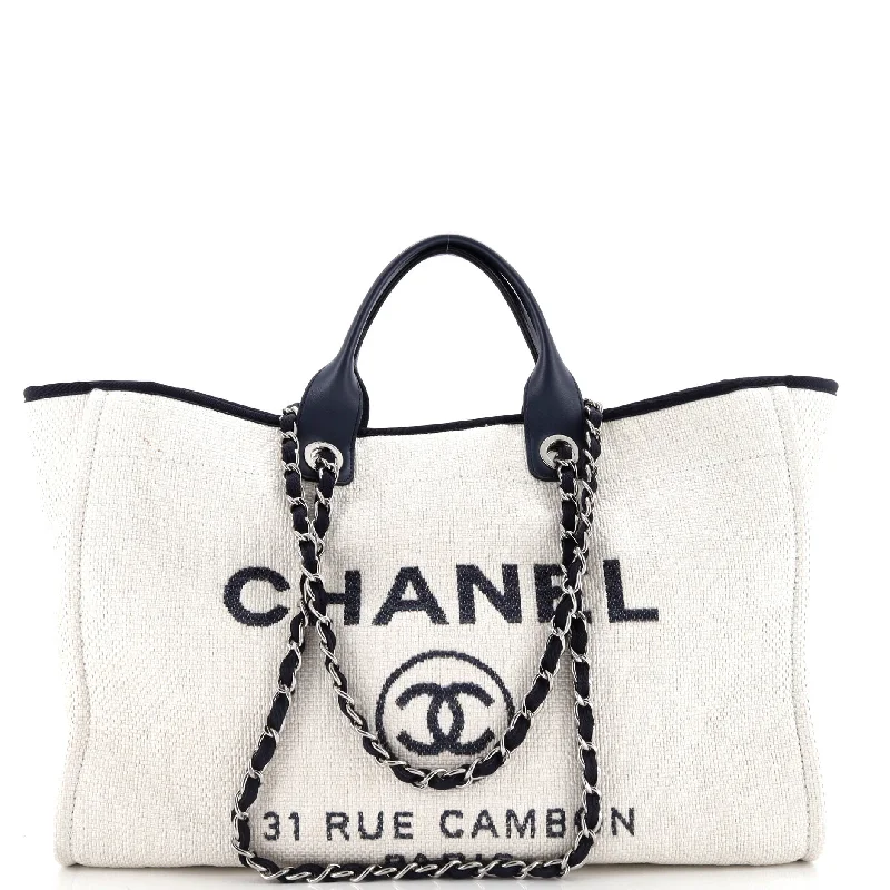 Christian Dior tote bags with a printed Dior logo on the frontDeauville Tote Raffia XL