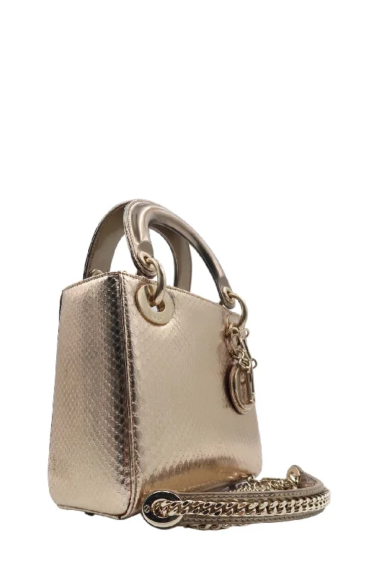 Christian Dior Saddle bags with a distressed leather finishPython Mini Lady Dior Gold