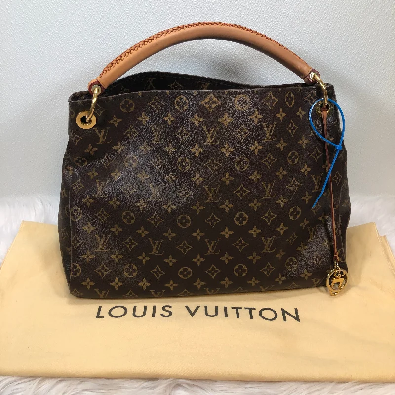 Louis Vuitton bags with a chain - link trim and a leather body for a modern edgeHandbag Designer By Louis Vuitton  Size: Large