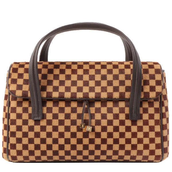 Louis Vuitton bags with a chain - link trim and a leather body for a modern edgeLouis Vuitton 2002 Made Damier Sauvage Lion Brown