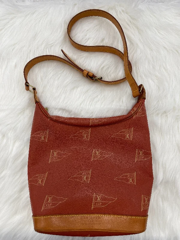 Louis Vuitton bags with a chain - link trim and a leather body for a modern edgeHandbag Designer By Louis Vuitton  Size: Medium