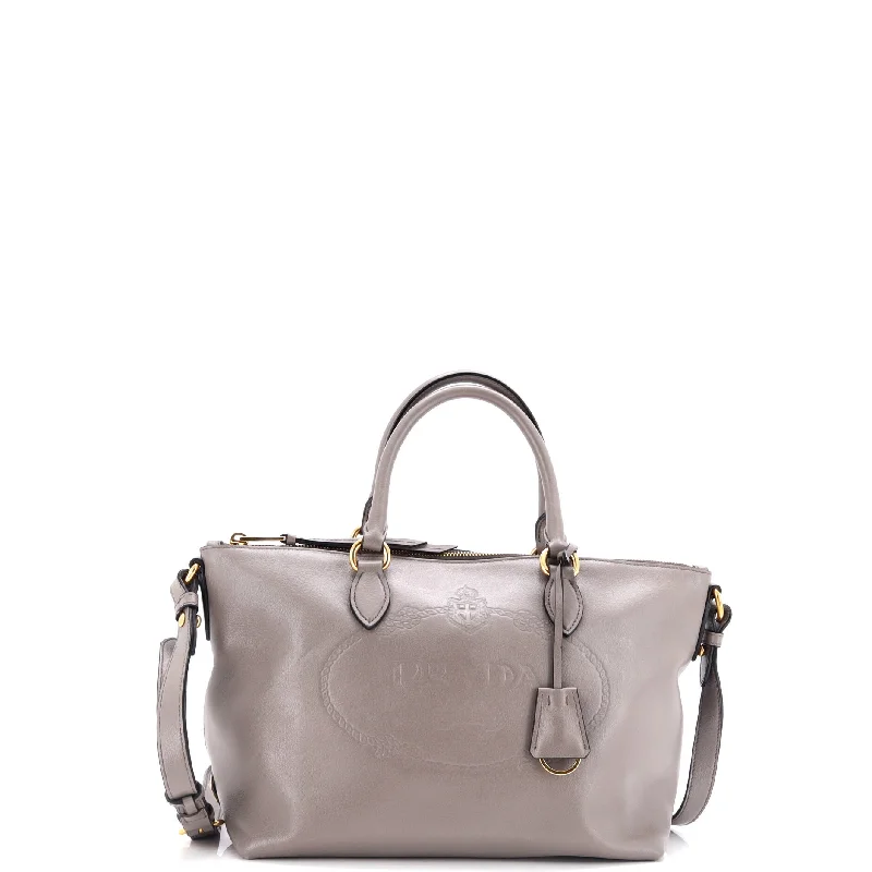 Contemporary Christian Dior handbags with a unique shapeEmbossed Logo Convertible Tote Glace Calf Small