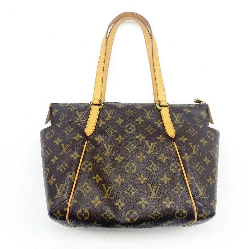 Louis Vuitton bags with a chain - link trim and a leather body for a modern edgeHandbag Luxury Designer By Louis Vuitton  Size: Medium