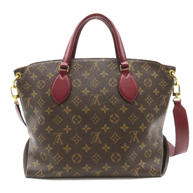 Louis Vuitton bags with a chain - link trim and a leather body for a modern edgeLOUIS VUITTON Flower zip tote MM Brown Red Bordeaux Monogram PVC coated canvas leather M44348