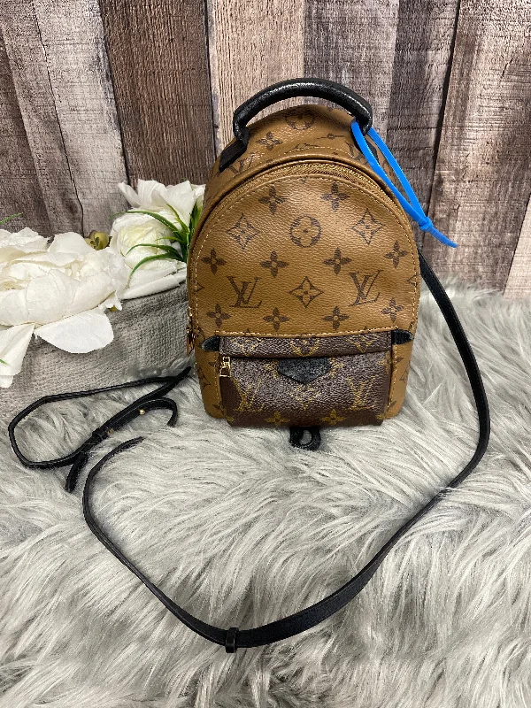 Louis Vuitton bags with a chain - link trim and a leather body for a modern edgeBackpack Luxury Designer By Louis Vuitton  Size: Small