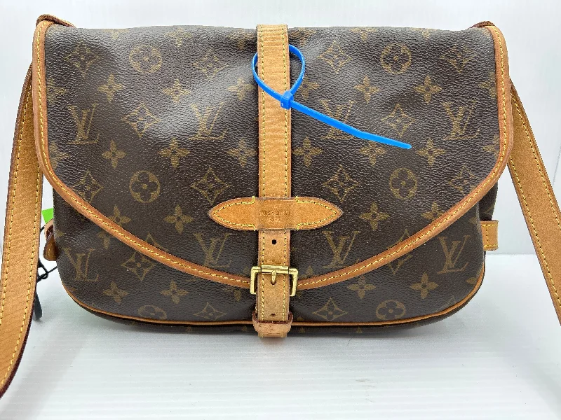 Louis Vuitton bags with a chain - link trim and a leather body for a modern edgeHandbag Luxury Designer By Louis Vuitton  Size: Medium