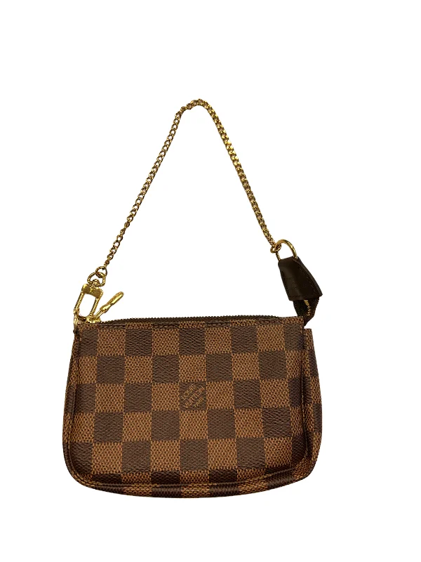 Louis Vuitton bags with a chain - link trim and a leather body for a modern edgeHandbag Luxury Designer By Louis Vuitton  Size: Small