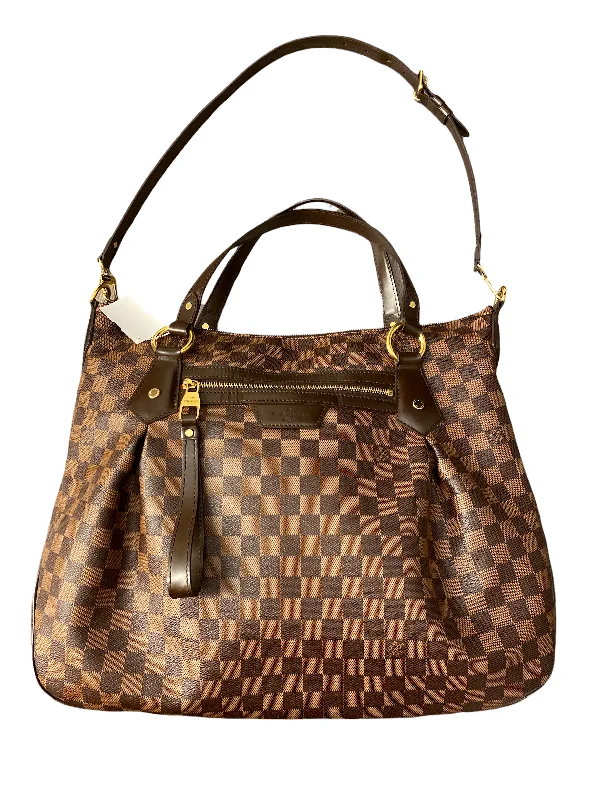 Louis Vuitton bags with a chain - link trim and a leather body for a modern edgeHandbag Designer By Louis Vuitton  Size: Large